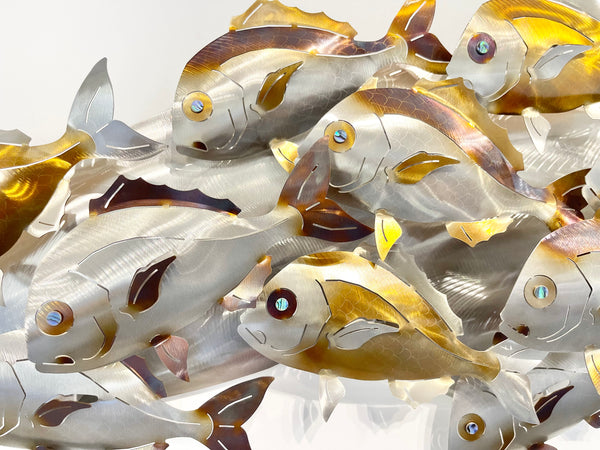 Under size “Snapper school” in multi & gold colourings